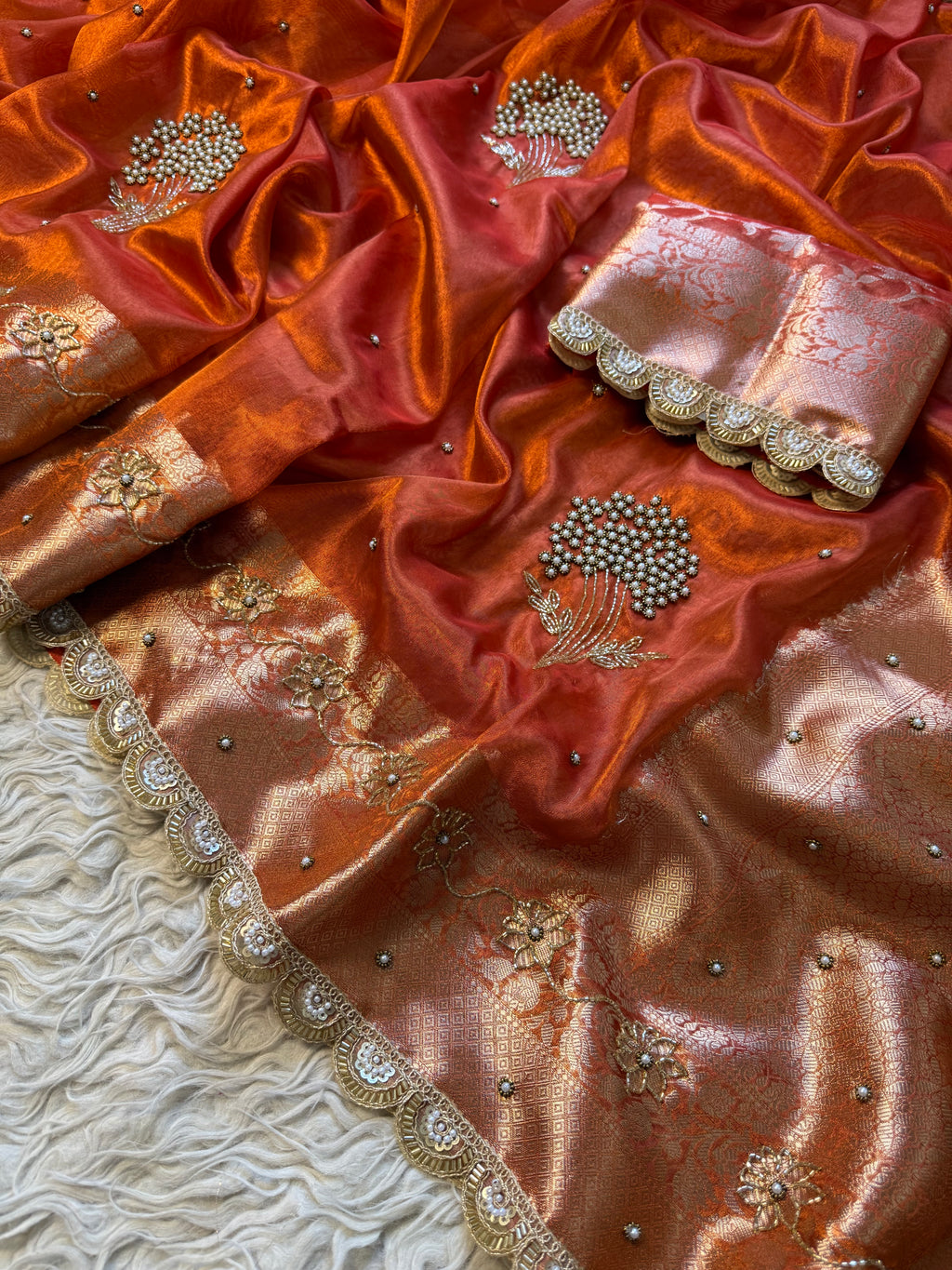 Designer orange pearl and cutdana handwork in buta pattern Tissue Silk Saree