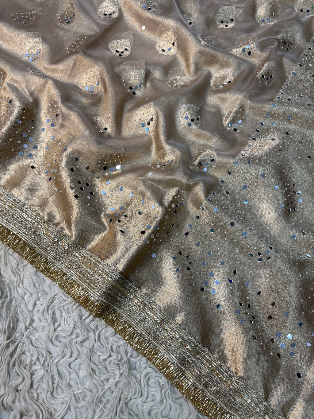 Ivory Designer Banarasi Tissue Buta Saree with Pearl and mirror Work on all over Body with Intricate Border and Gotta Patti Lace Work