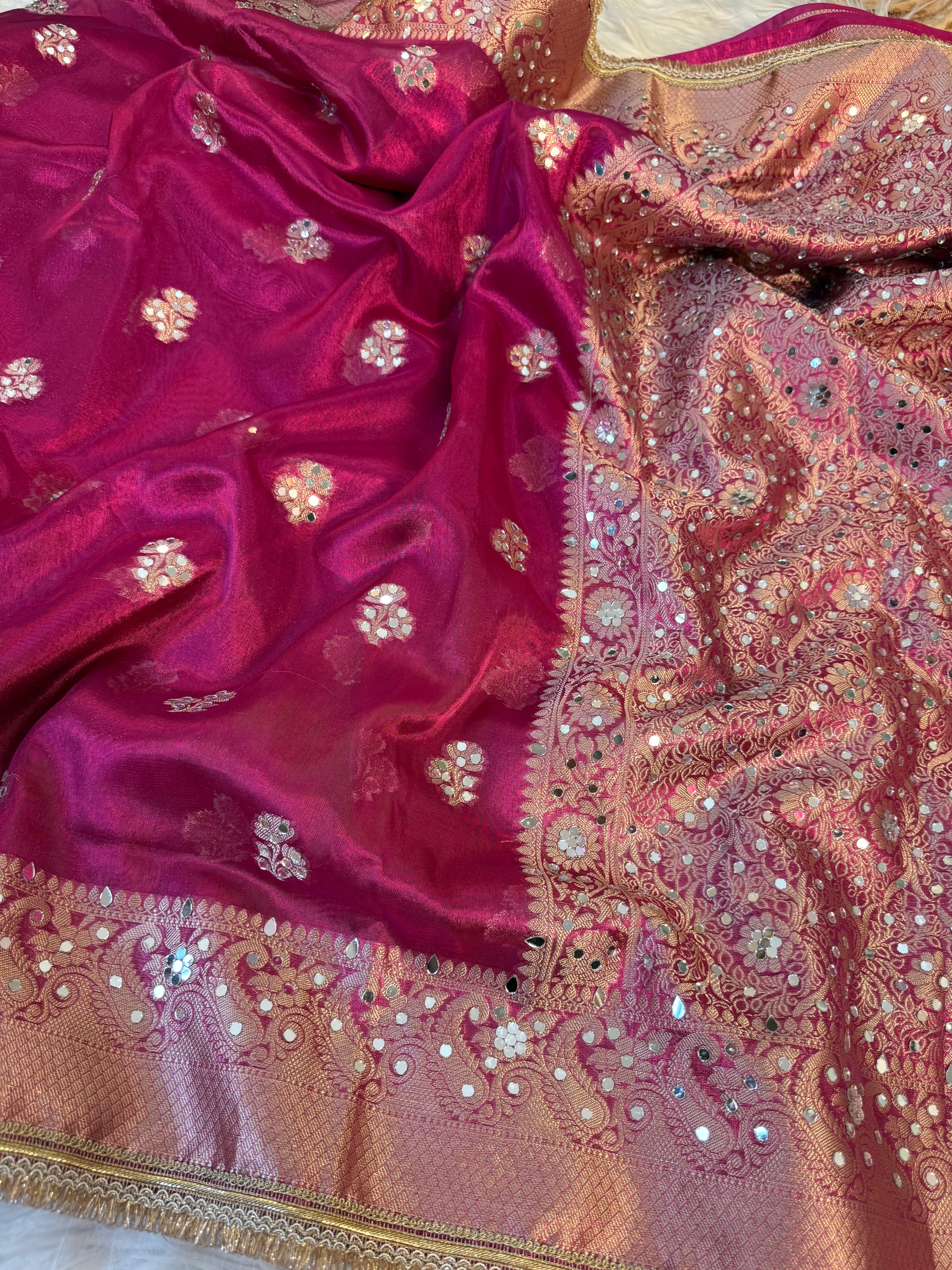 Designer Banarasi Tissue Saree with mirror Work on all over Body with Intricate Border and Pallu Design Along with heavy mirror work and Gotta Patti Lace Work