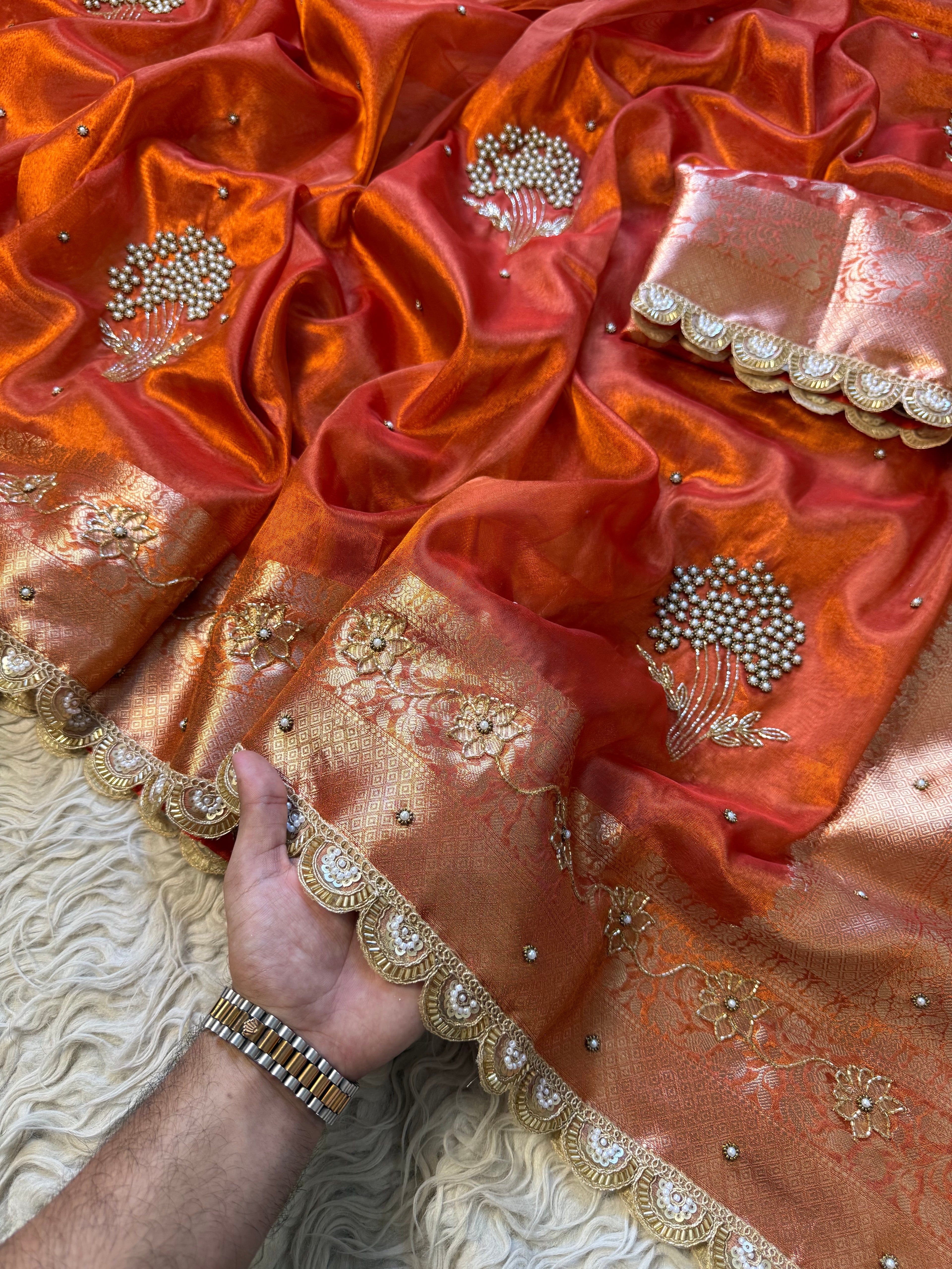 Designer orange pearl and cutdana handwork in buta pattern Tissue Silk Saree