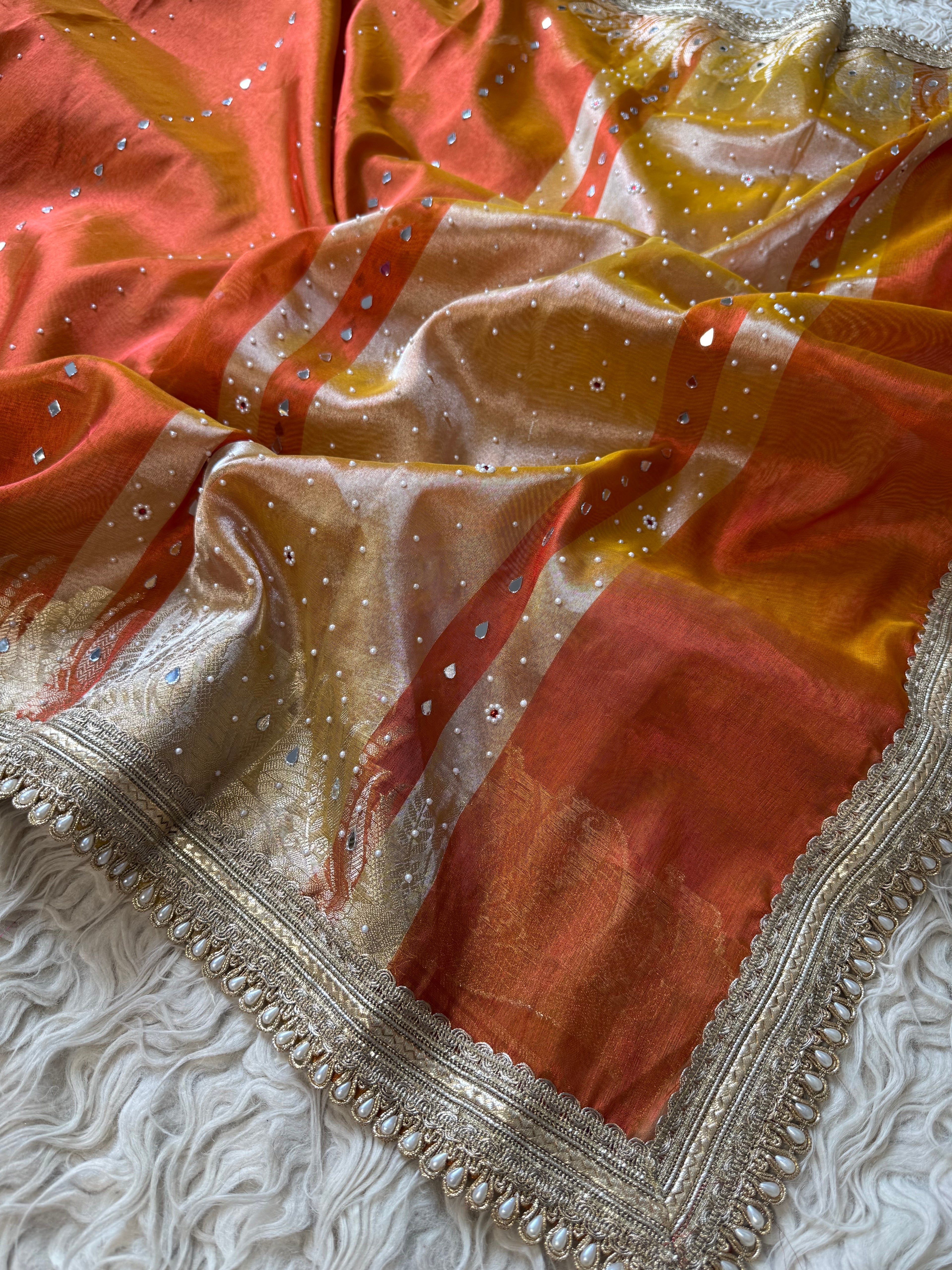 Designer Banarasi Tissue Saree with mirror Work on all over Body with Intricate Border and Pallu Design Along with heavy mirror work and Gotta Patti Lace Work