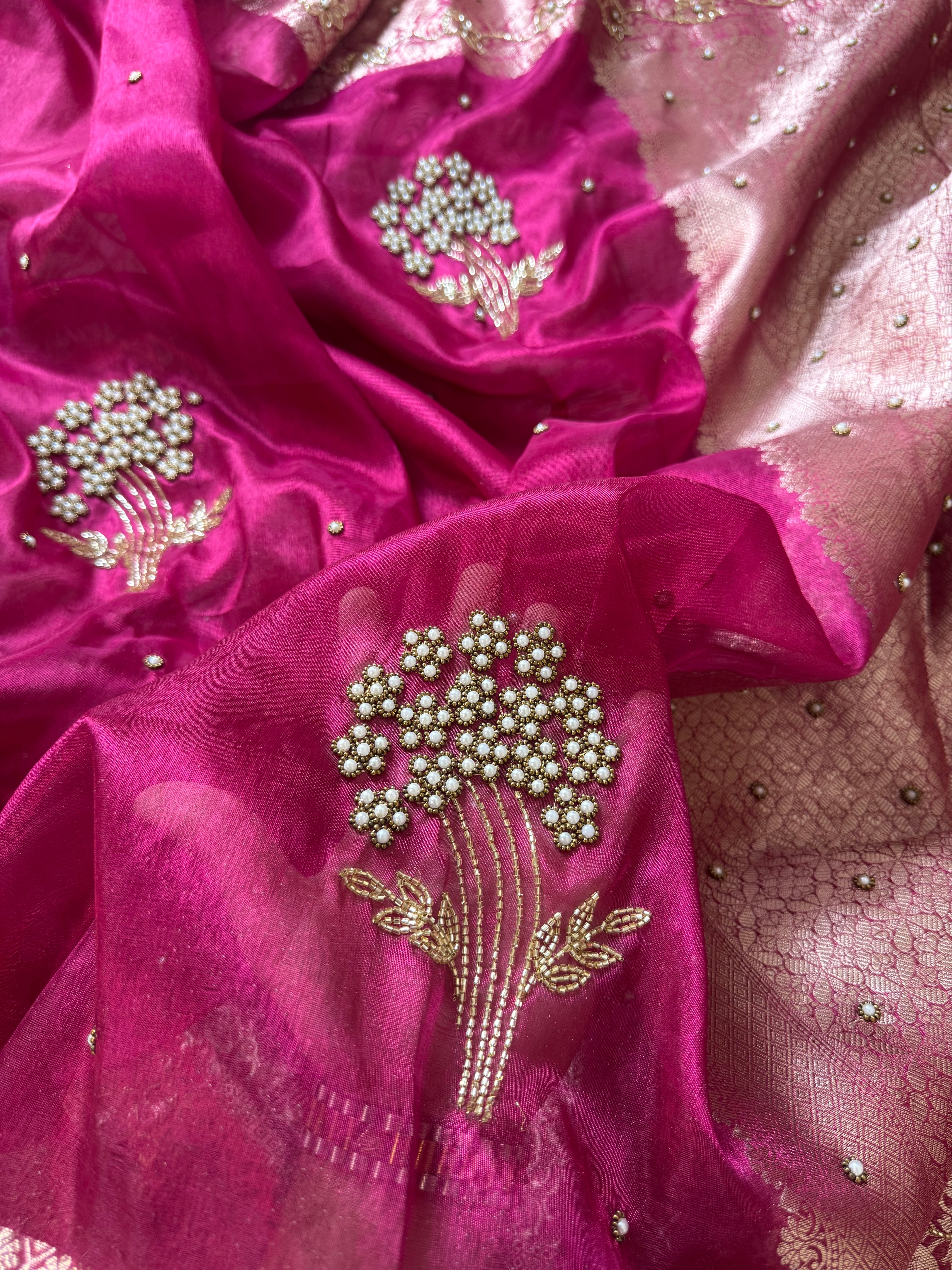 Designer Rani pink pearl and cutdana handwork in buta pattern Tissue Silk Saree
